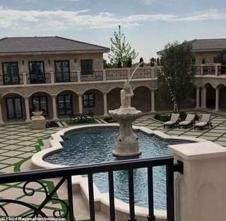 Floyd Mayweather shows off his gigantic new home that has a cinema, 225-bottle wine rack and candy shop (photos)