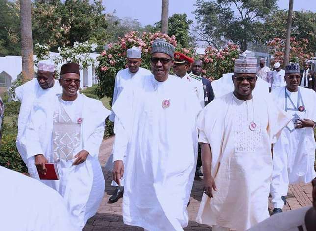 President Muhammadu Buhari (middle) flanked by the Kaduna State Governor, Nasir El-Rufai (left) and Kogi State Governor, Yahaya Bello (right) (Facebook/Maiwada B Atake)