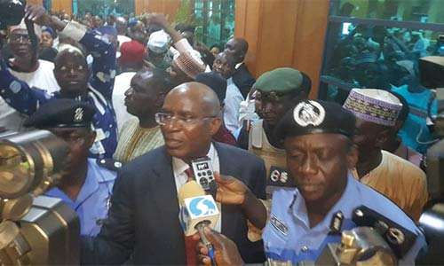 People struggle for the mace after it was seized from the National Assembly chamber by hoodlums on April 18, 2018 (Twitter/@NaijaVirals)